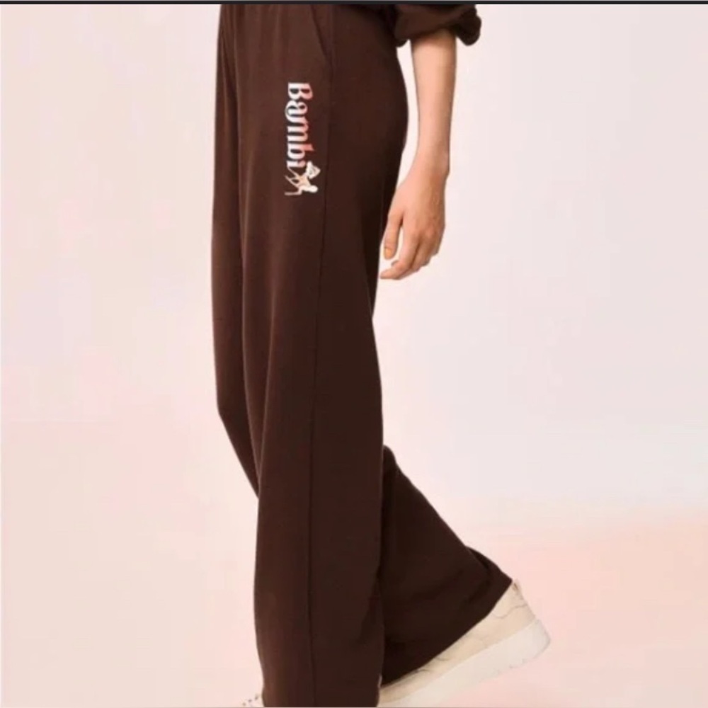 H&M Divided brown wide-legged sweatpants with a Bambi print on one leg. H&M XL